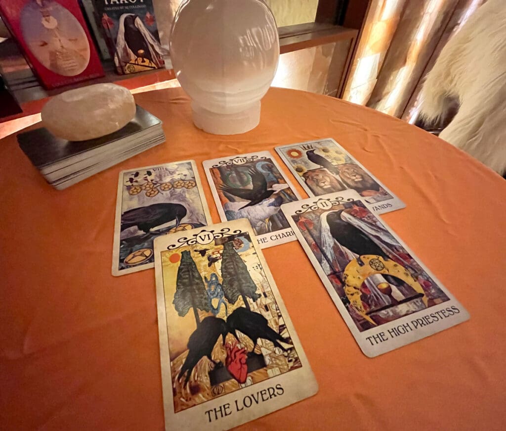 Tarot cards spread out on a table for a reading